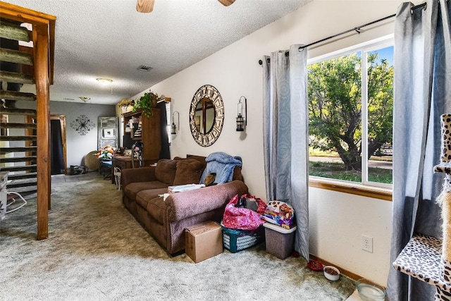 288 Ballard St, Tow, TX 78672 - carpeted living area with a textured ceiling and visible vents