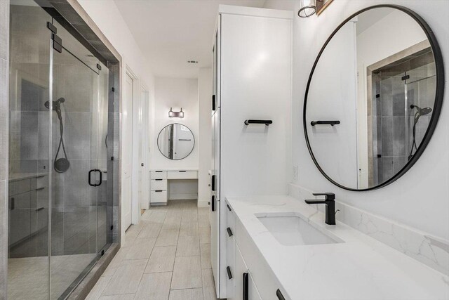 1105 Lipan Trl, Austin, TX 78733 - bathroom featuring double vanity and a stall shower
