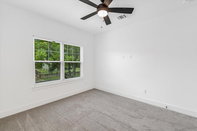 1105 Lipan Trl, Austin, TX 78733 - spare room with carpet and a ceiling fan