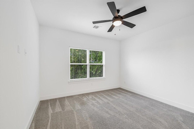1105 Lipan Trl, Austin, TX 78733 - spare room featuring carpet and ceiling fan
