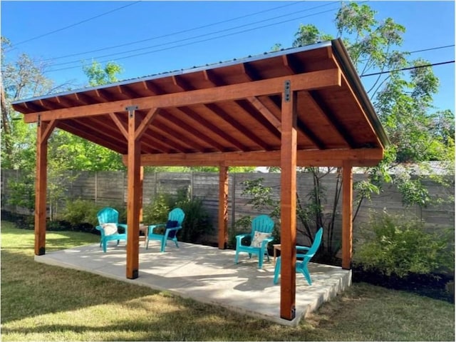 1105 Lipan Trl, Austin, TX 78733 - fenced backyard featuring a patio area