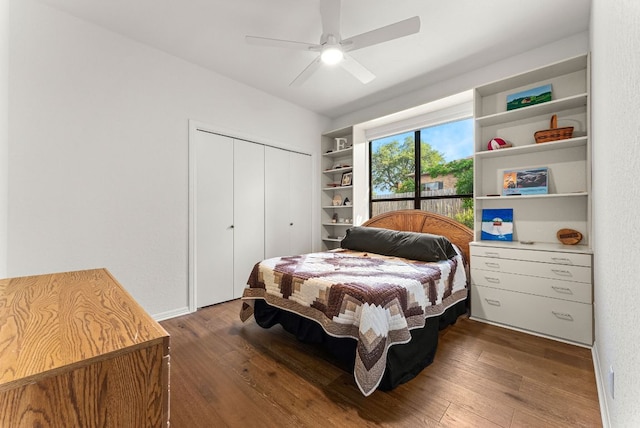 bedroom with ceiling fan, hardwood / wood-style flooring, and a closet