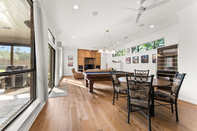 dining area featuring crown molding, ceiling fan, recessed lighting, pool table, and light wood finished floors