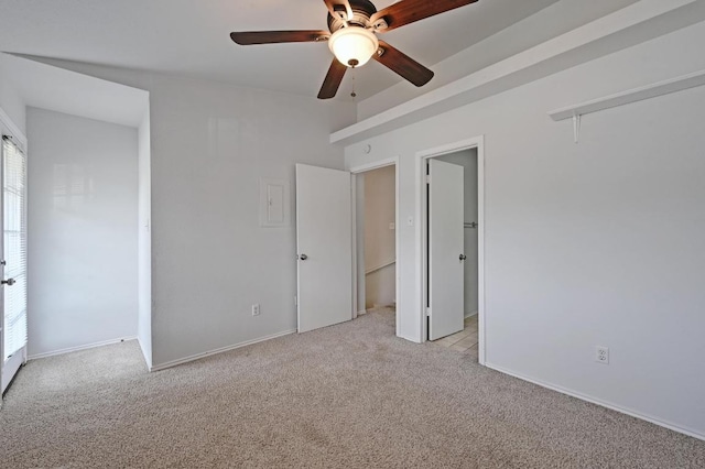 1815 River Crossing Cir Unit A, Austin, TX 78741 - unfurnished bedroom featuring light colored carpet, a ceiling fan, and baseboards