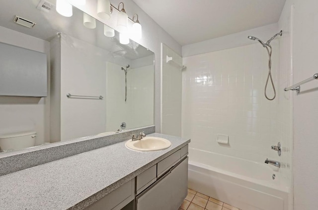 1815 River Crossing Cir Unit A, Austin, TX 78741 - full bath with tile patterned flooring, toilet, vanity, and shower / washtub combination