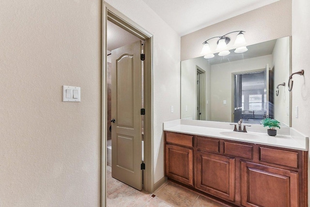 bathroom featuring tile patterned floors and vanity