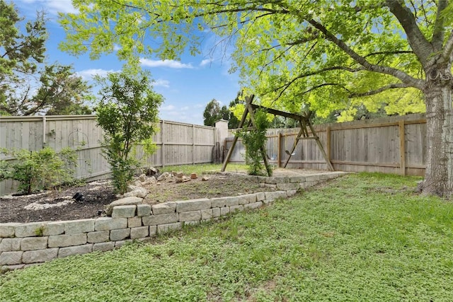 view of yard with a fenced backyard