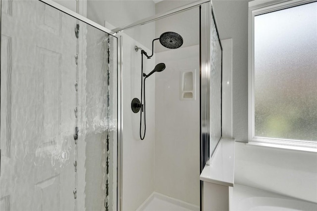 bathroom with a stall shower