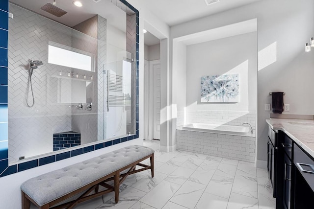 full bathroom with vanity, marble finish floor, visible vents, tiled shower, and a garden tub