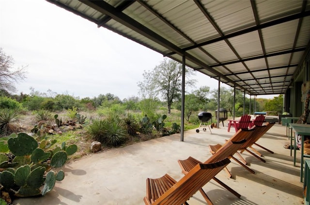 surrounding community with a patio area