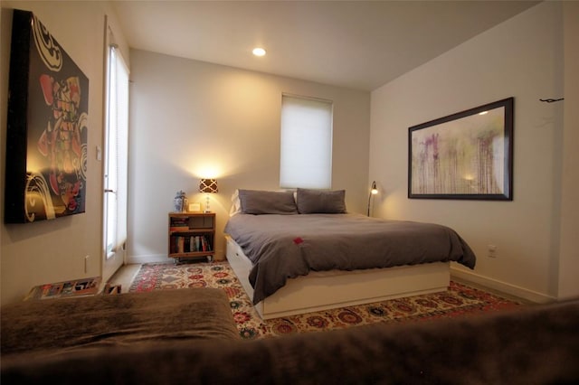 1145 Longhorn Dr, Burnet, TX 78611 - bedroom featuring baseboards, multiple windows, and recessed lighting