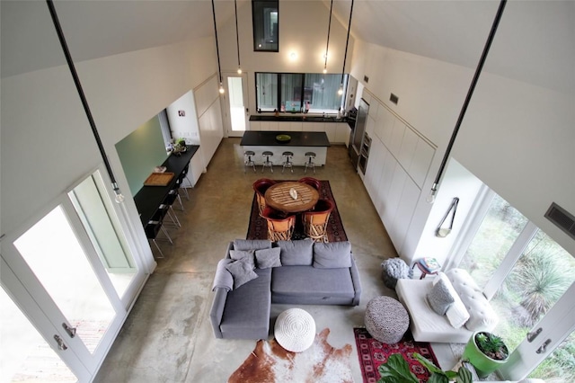 living room with concrete flooring