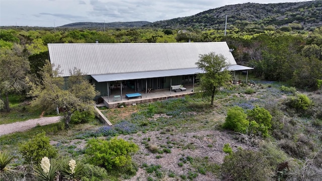exterior space featuring a mountain view