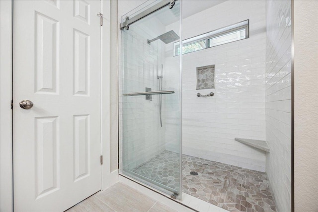 full bathroom featuring a stall shower