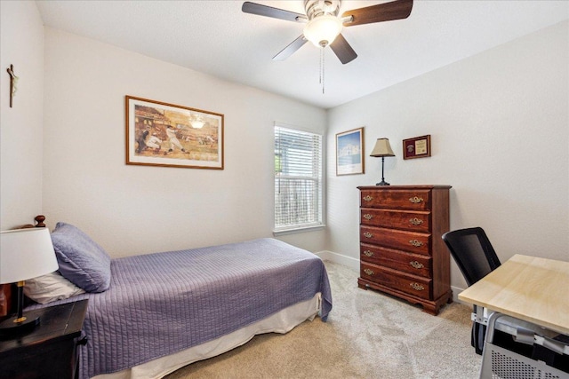 706 Wagon Wheel Trl, Pflugerville, TX 78660 - bedroom with carpet floors, a desk, and a ceiling fan