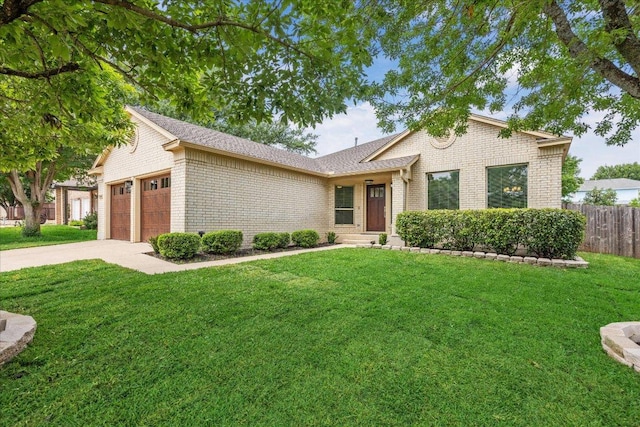 ranch-style house with a front lawn, fence, brick siding, concrete driveway, and an attached garage