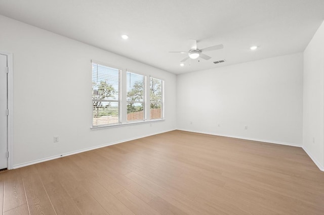 12126 Cantabria Rd, Austin, TX 78748 - spare room with a ceiling fan, light wood-style floors, and recessed lighting