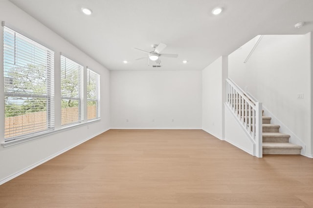 12126 Cantabria Rd, Austin, TX 78748 - unfurnished room featuring stairs, ceiling fan, light wood finished floors, recessed lighting, and a smoke detector