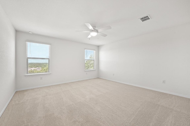 12126 Cantabria Rd, Austin, TX 78748 - unfurnished room featuring light carpet and a ceiling fan