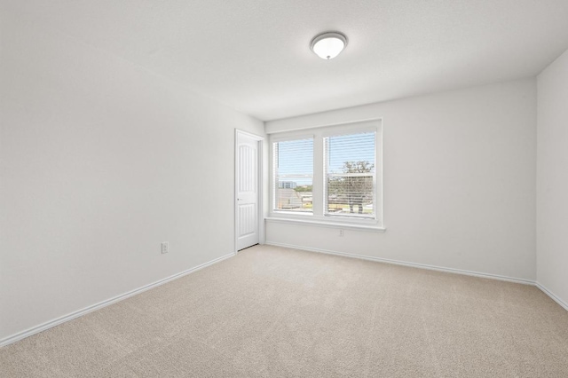 12126 Cantabria Rd, Austin, TX 78748 - empty room featuring light carpet and baseboards