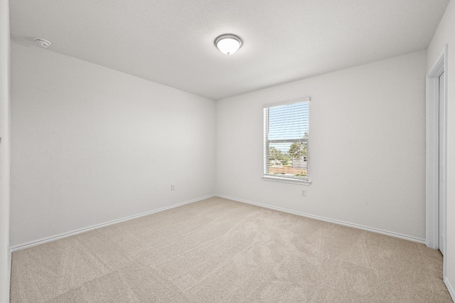 12126 Cantabria Rd, Austin, TX 78748 - unfurnished room with light colored carpet and a smoke detector