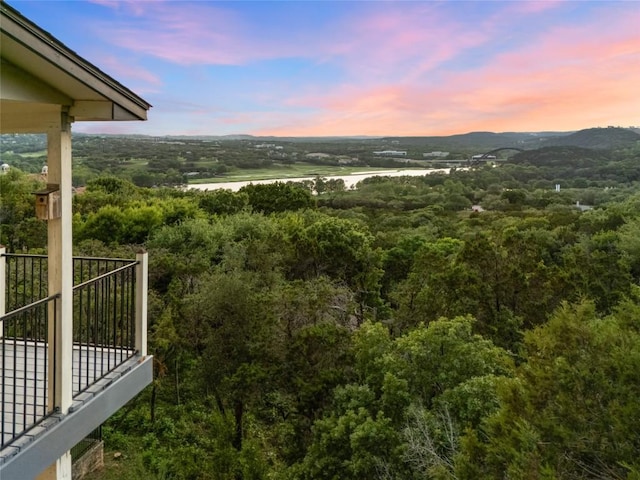view of mountain feature with a view of trees