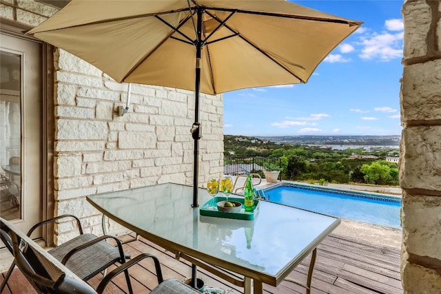 3606 Bunyan Cir, Lago Vista, TX 78645 - balcony with view of pool and outdoor dining area