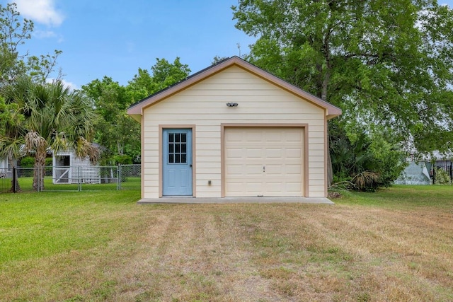 detached garage with fence