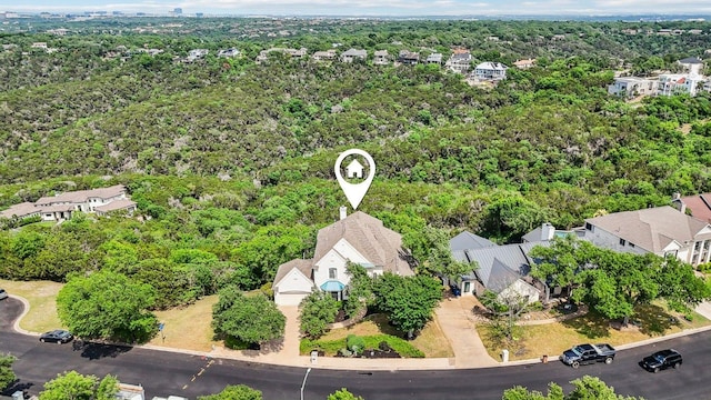 7100 Valburn Dr, Austin, TX 78731 - view of property location featuring nearby suburban area and a heavily wooded area