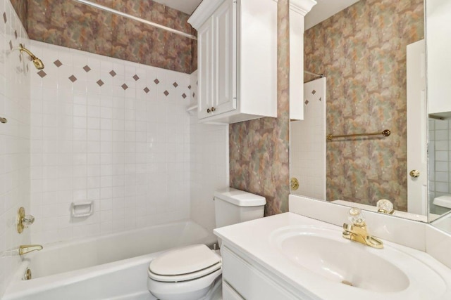 bathroom featuring vanity,  shower combination, and toilet