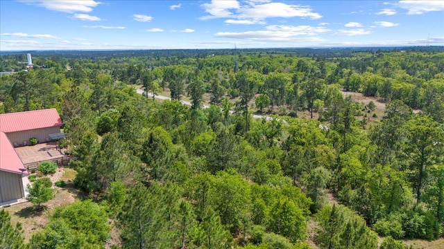 aerial view featuring a forest view
