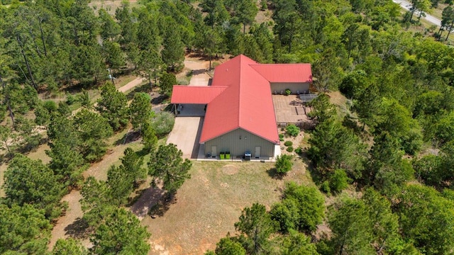 178 Pine Tree Loop, Bastrop, TX 78602 - view of subject property featuring a heavily wooded area