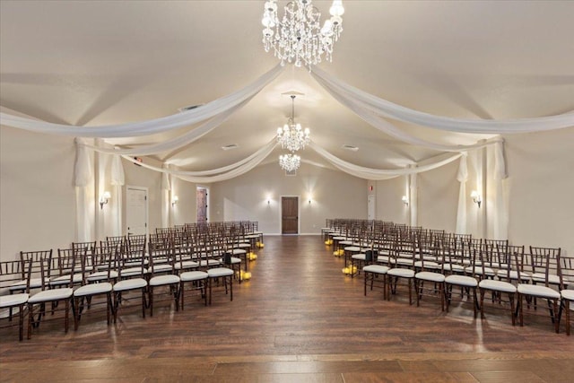 misc room featuring crown molding, visible vents, hardwood / wood-style flooring, and a notable chandelier