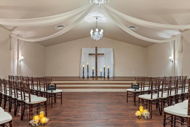 interior space featuring visible vents, an inviting chandelier, and wood finished floors