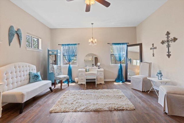 178 Pine Tree Loop, Bastrop, TX 78602 - living area with a chandelier, wood finished floors, and ceiling fan