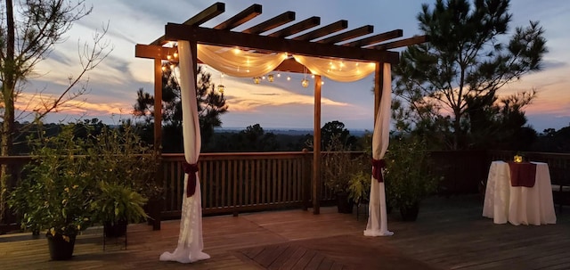 178 Pine Tree Loop, Bastrop, TX 78602 - deck at dusk with a pergola