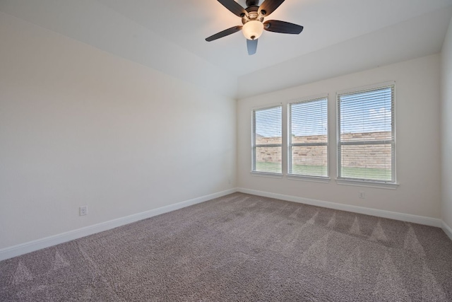 unfurnished room featuring baseboards, a ceiling fan, and carpet flooring