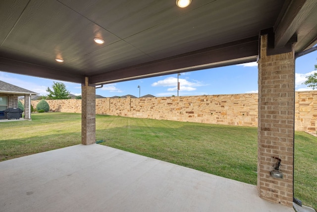 view of patio with fence