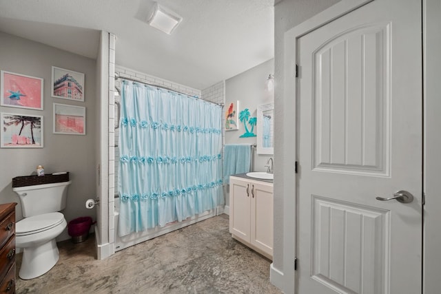 bathroom with toilet, baseboards, shower / bath combination with curtain, and vanity