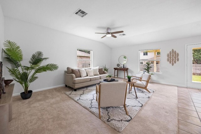 1400 Chardonnay Xing, Leander, TX 78641 - carpeted living area with ceiling fan and tile patterned floors