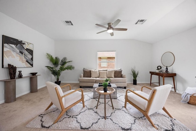 living room featuring visible vents, baseboards, ceiling fan, and carpet floors