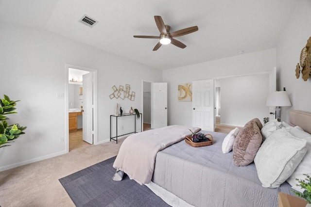 1400 Chardonnay Xing, Leander, TX 78641 - bedroom featuring light carpet, connected bathroom, and ceiling fan