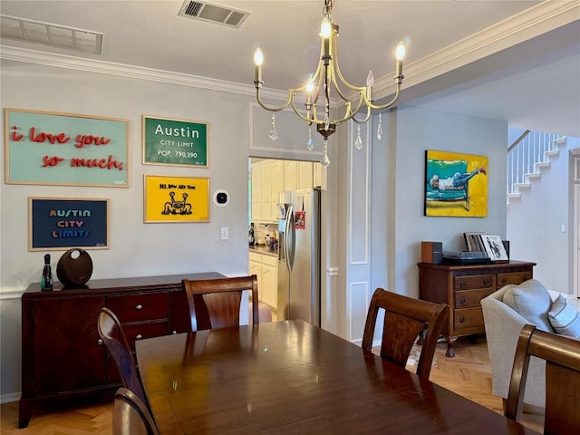 12600 Schreiner Ct, Austin, TX 78732 - dining space featuring a chandelier, crown molding, and stairs