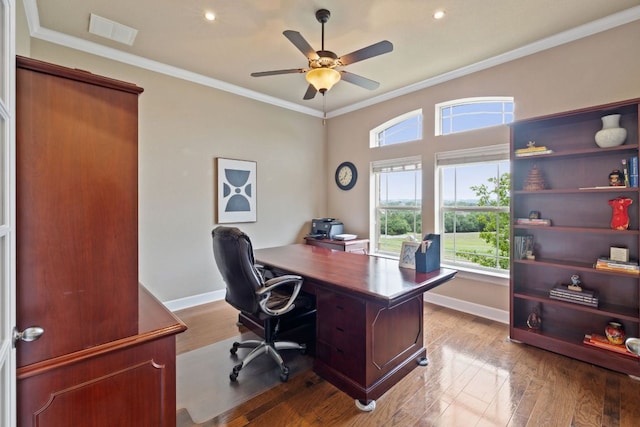 office featuring ceiling fan, visible vents, a healthy amount of sunlight, and light wood-type flooring