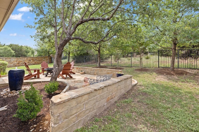 13358 Mesa Verde Dr, Austin, TX 78737 - fenced backyard with an outdoor fire pit and a patio area