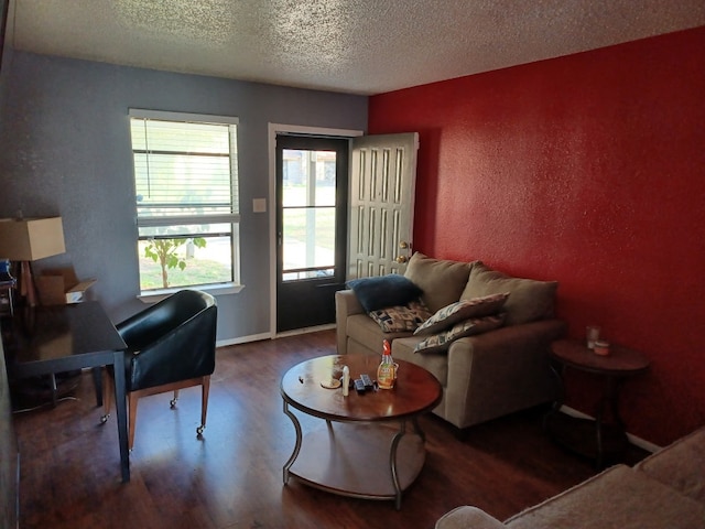 913 N 19th St, Copperas Cove, TX 76522 - living area with wood finished floors, a textured ceiling, and a textured wall