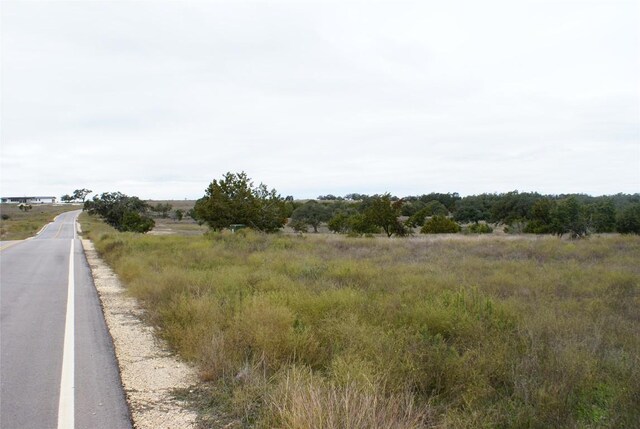413 E Flying Owl Dr, Johnson City, TX 78636 - view of asphalt street featuring a view of countryside