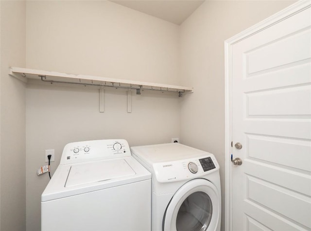 800 Savannah Cv, Elgin, TX 78621 - laundry area featuring separate washer and dryer
