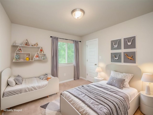 800 Savannah Cv, Elgin, TX 78621 - bedroom featuring light carpet and baseboards
