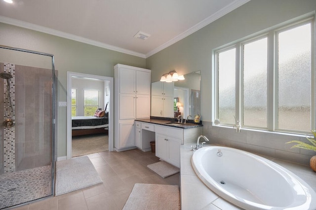 bathroom with vanity, crown molding, connected bathroom, a bath, and a shower stall